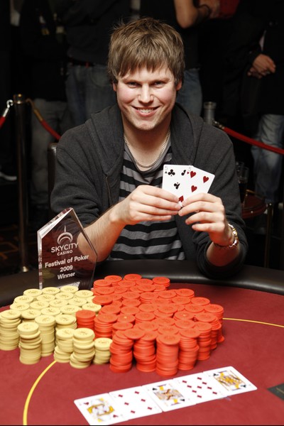 KYCITY Festival of Poker winner Simon Watt; Simon in action earlier in the day and Simon with Executive Manager of Table Games, Ejaaz Dean and his trophy.